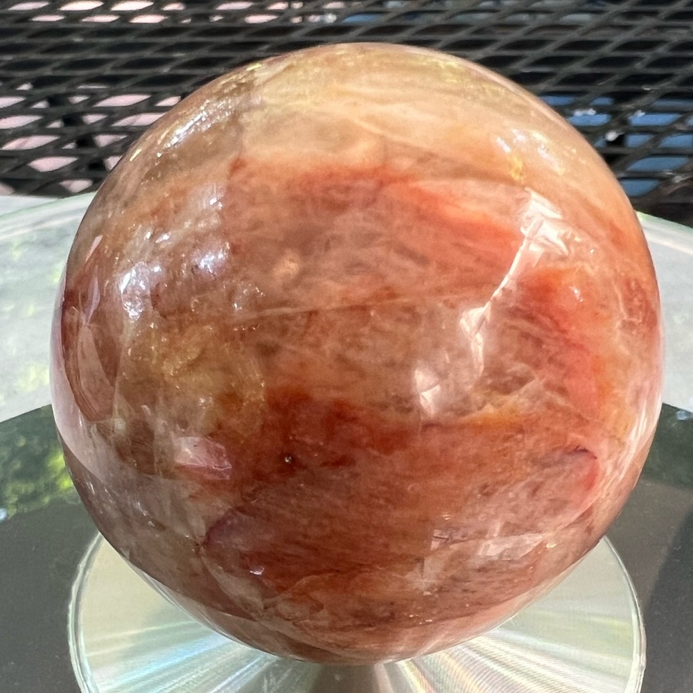 Stunning red moonstones sphere, 150g
